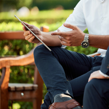 2 business man on Tablet